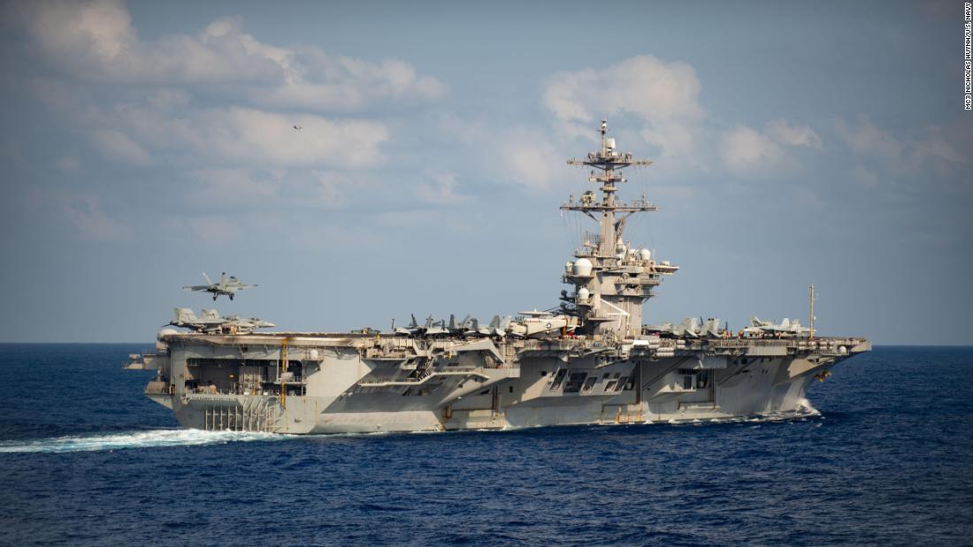 Two US sailors assigned to French aircraft carrier hit by pandemic outbreak test positive for coronavirus
